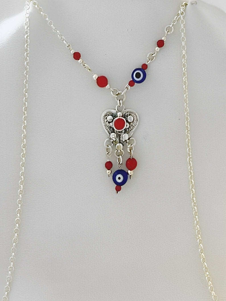B374- Filigree heart Necklace with coral stone