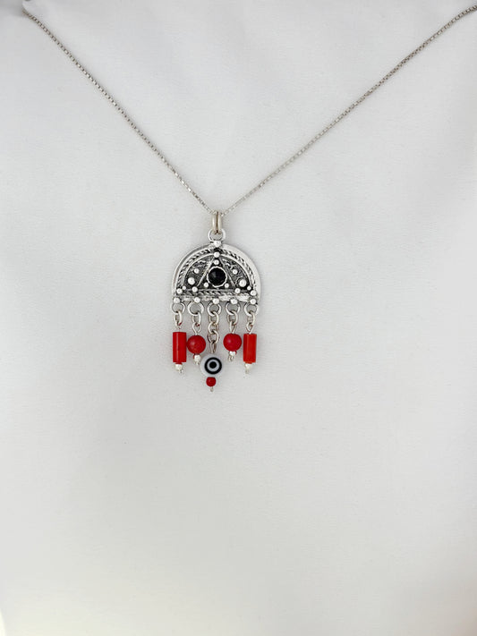 B395- Filigree Moon Pendant with Carnelian