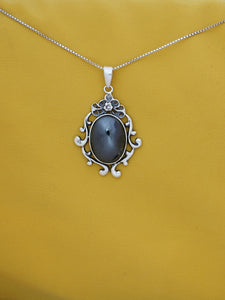 B5- Oval Shaped Stone with Ornamented Frame with Multiple Stones - Zehava Jewelry