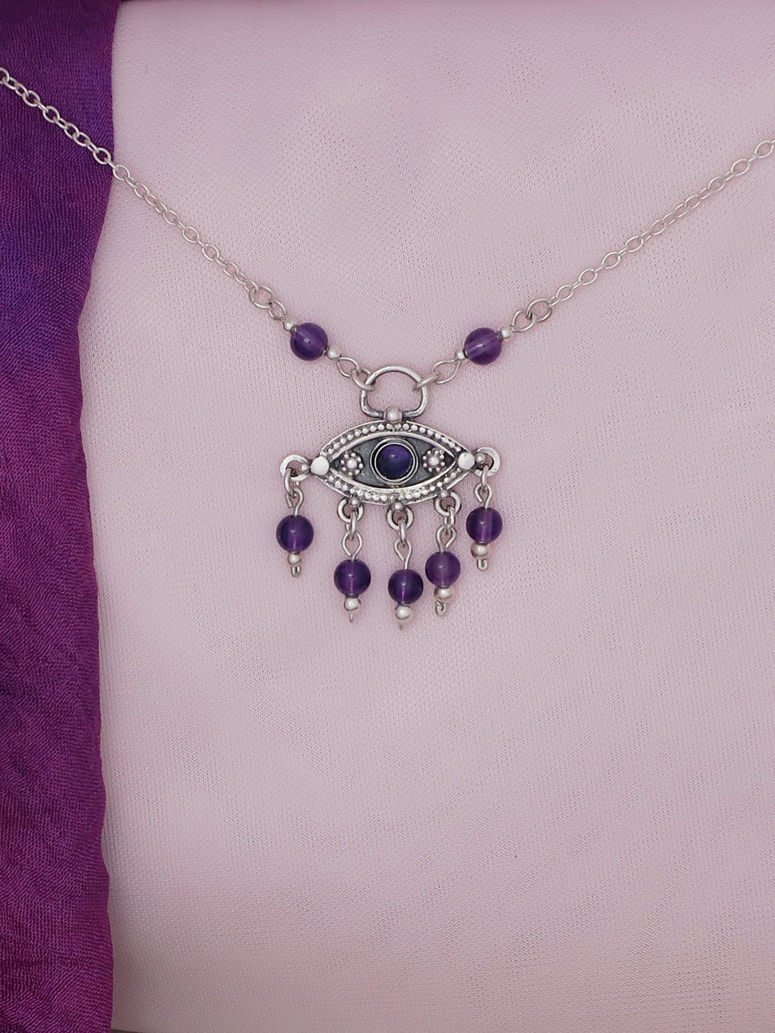 B112-Silver Eye Necklace with Amethyst