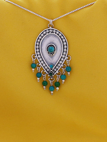 B300- Silver Pendant with Turquoise Stones