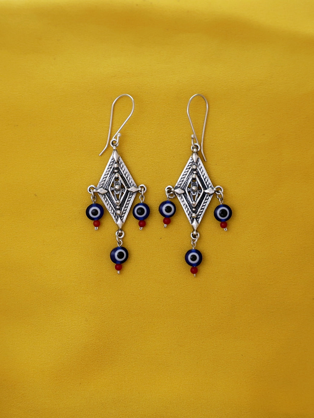 E104- Silver Earrings with Evil Eye