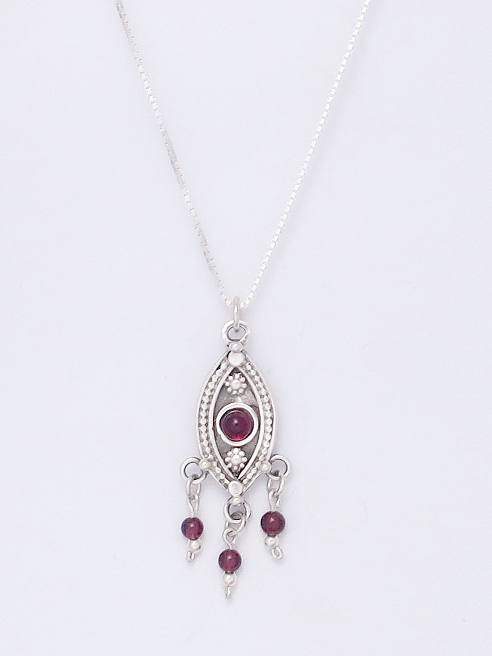 B95-Silver Eye Necklace with Garnet Stone