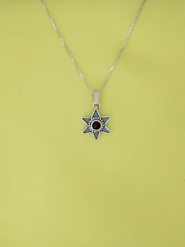 B46- Star Pendant with Garnet Stone - Zehava Jewelry