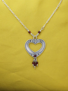 B164- Heart Necklace with Garnet