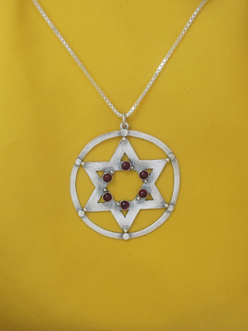 B168- David's Star Pendant with Garnet